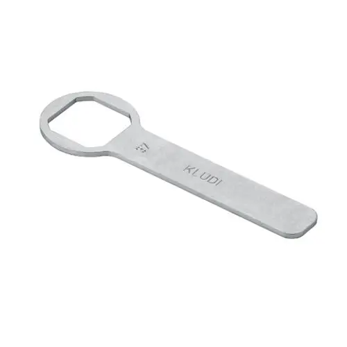 Kludi-Werkzeug mit einem geöffneten Schlüsselkopf, zur Verwendung als Spannschraubenschlüssel für Steuerungen. Flacher Griff und robustes Metalldesign sichtbar.